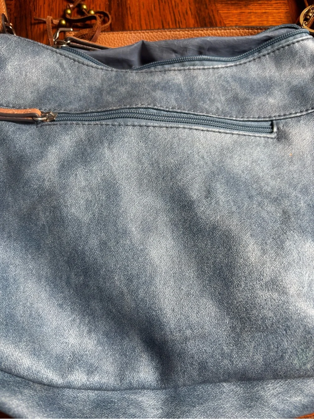 hobo-style shoulder bag denim-look faux leather in blue.